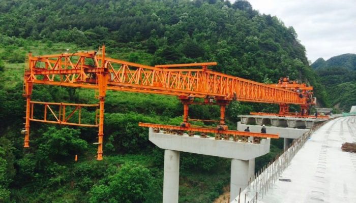 Bridge girder erection with gantry crane and launcher