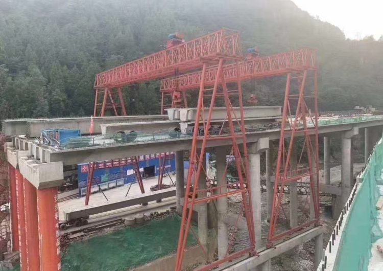 Bridge girder erection with gantry crane and launcher