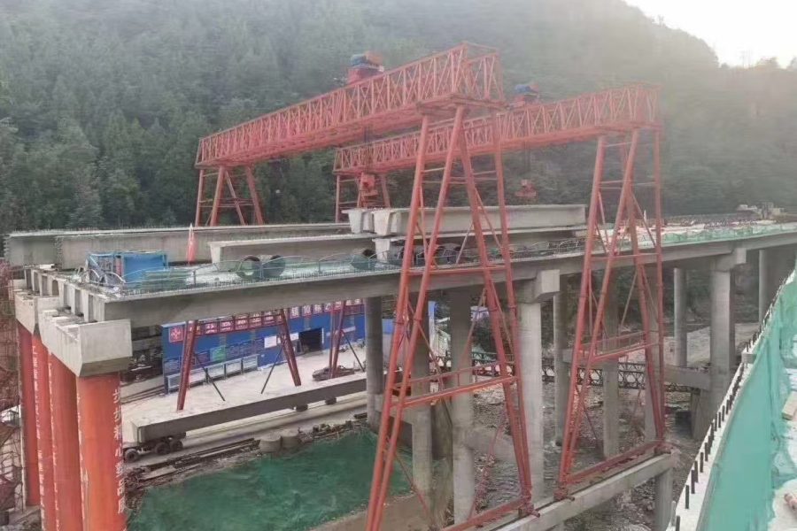 Bridge girder erection with gantry crane and launcher