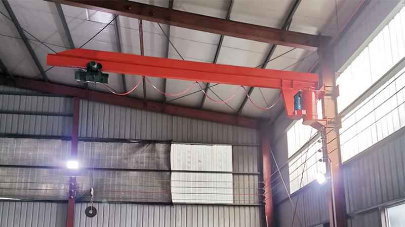 Wall-mounted jib cranes are ideal for areas where floor space is limited and rely on walls or columns for structural support.